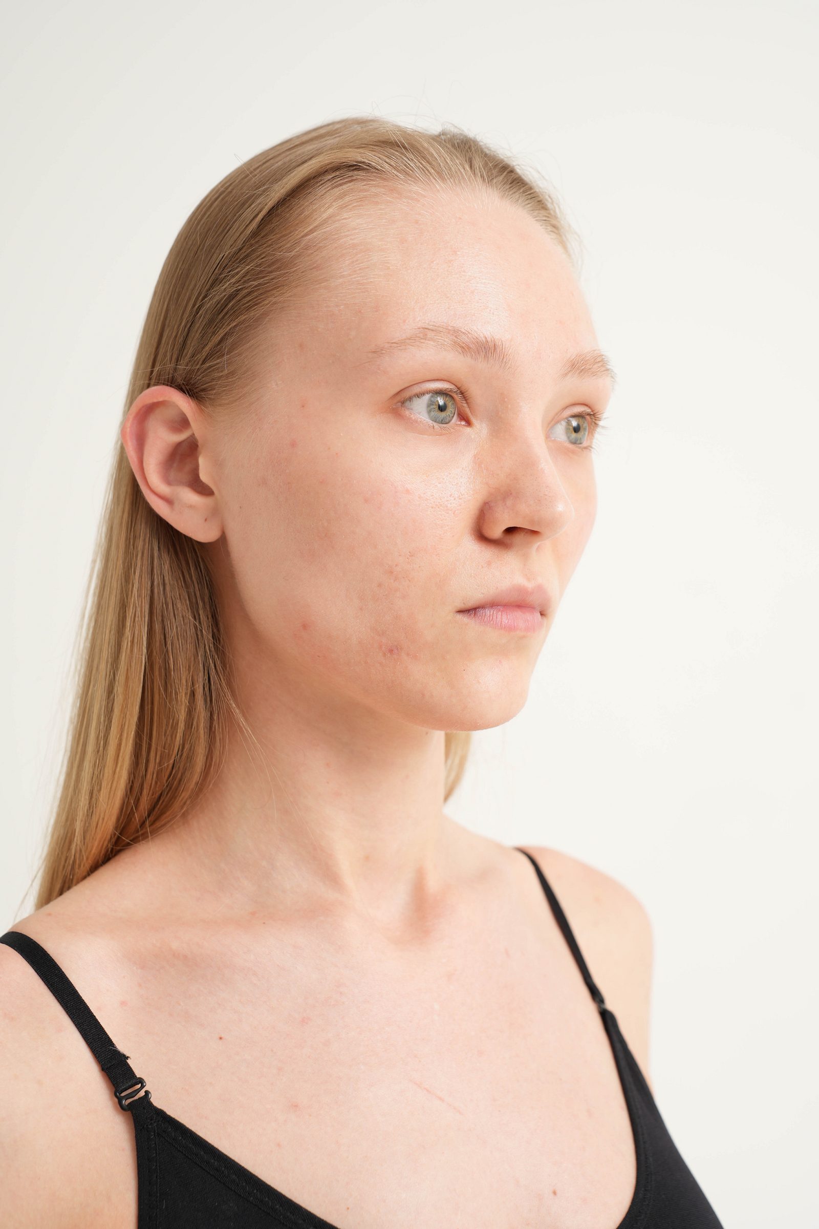 Three-quarter portrait of a woman against a white background